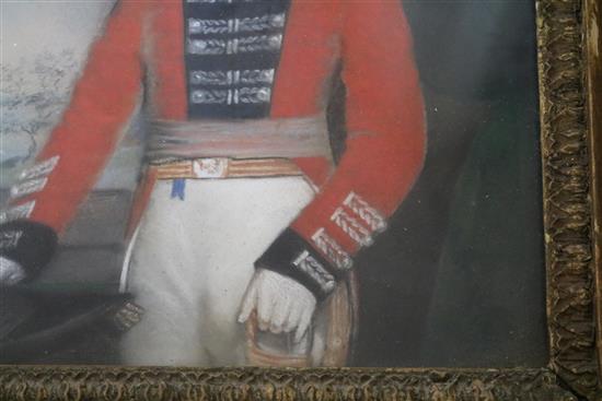 19th century English School, pastel portrait of an army officer, 24 x 21cm and a family coat of arms